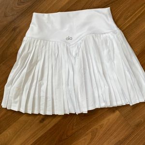 Brand New Alo Skirt with small stain. This skirt has been worn once.